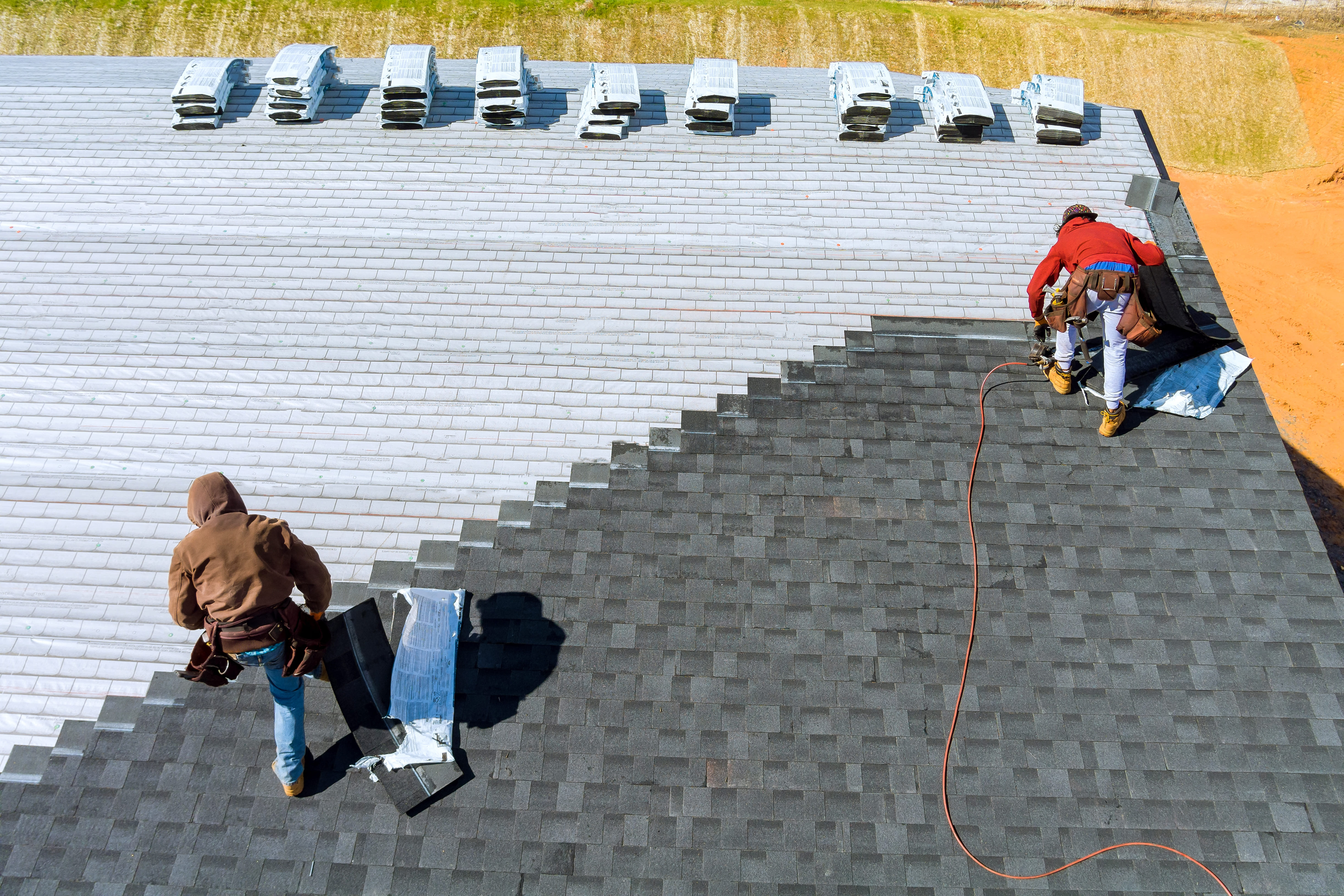 Worker Hands Installing Bitumen Roof Shingles With 2023 11 27 04 50 47 Utc